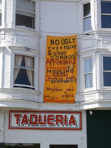 Sign protesting gentrification in the Mission District. [photo by ClockworkGrue via Flickr]