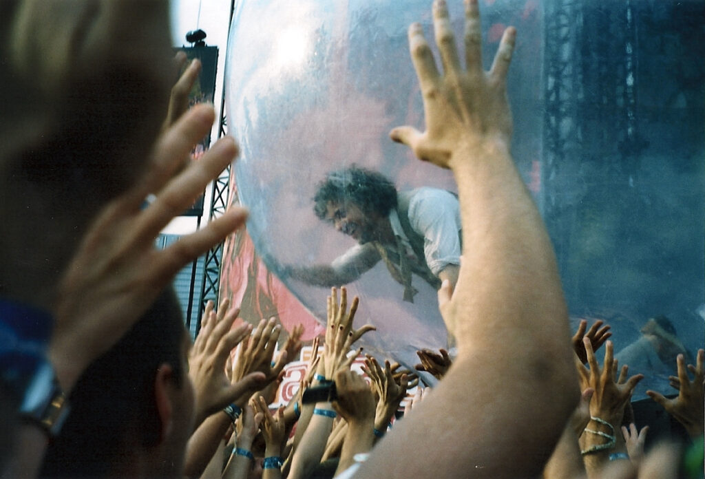 Photo taken by the author of The Flaming Lips' Wayne Coyne in a bubble, rolling over the crowd at Lollapalooza 2006, moments before the band broke into "Race for the Prize."